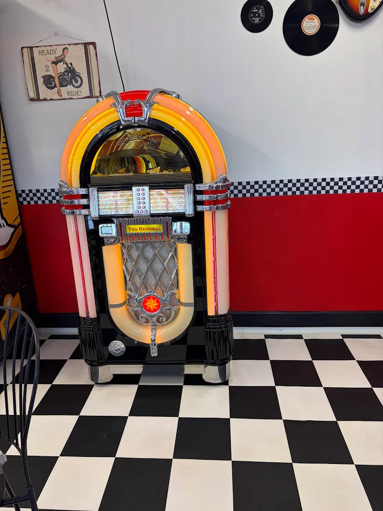 A vintage jukebox in the retro diner area at Somewhere to Go